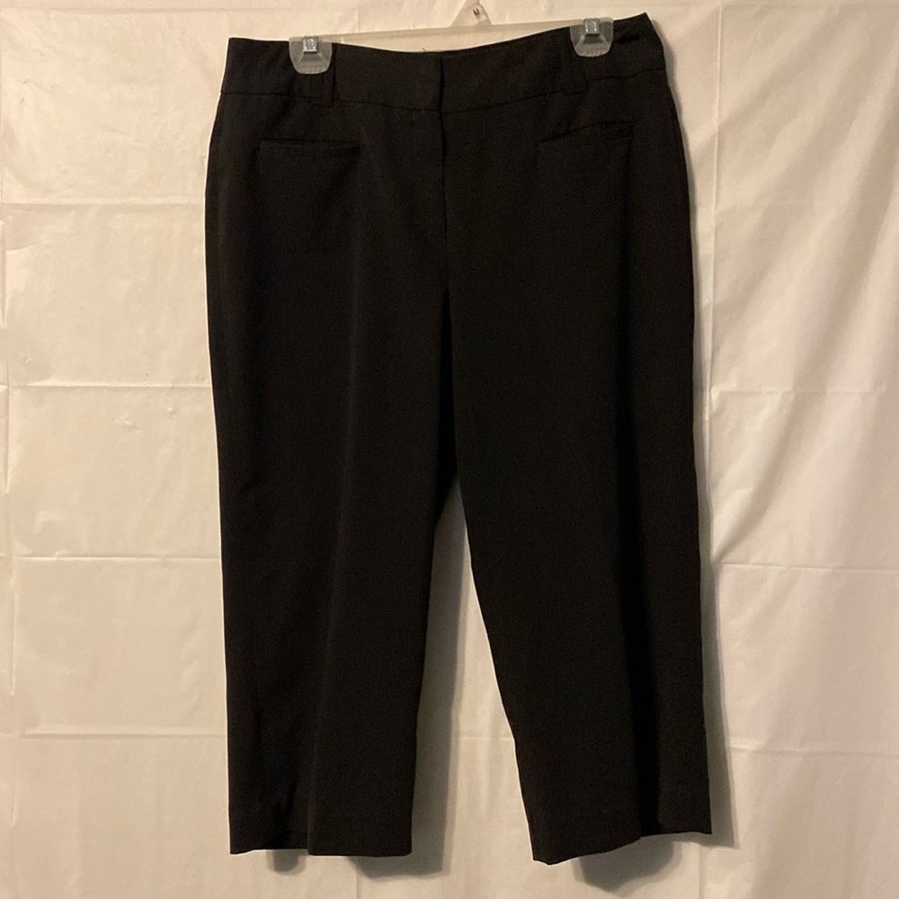 New Directions, black Capris size 10 pockets in front.